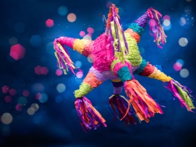 a colorful pinata in the shape of a star
