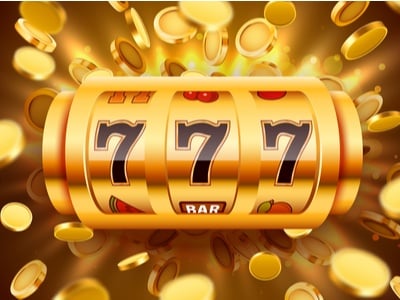 a golden three reel slot with coins flying all around