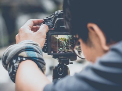 photographer lining up a camera angle  